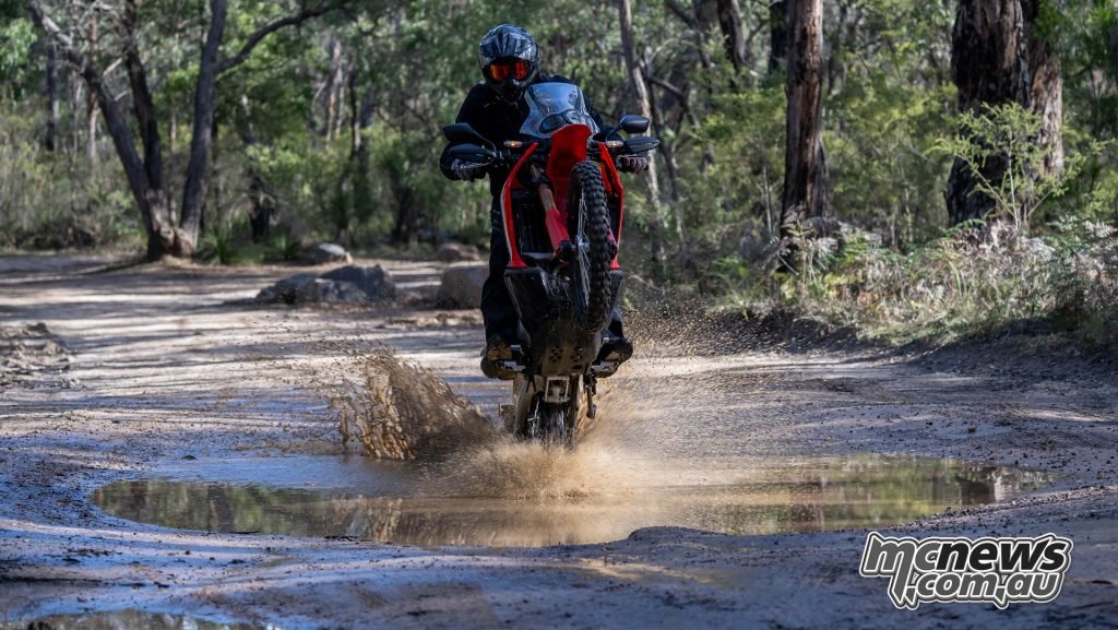 And that's just a great pic :) of the CRF300 Rally wheelieing through a puddle