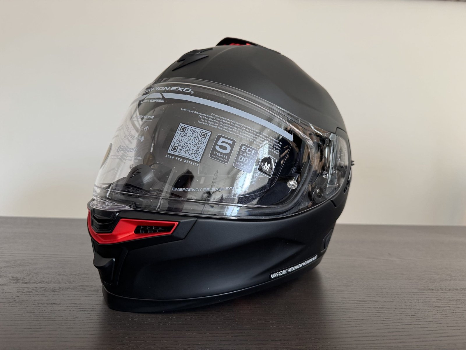 Angled front-facing view of the EXO-Eclipse helmet, clear face shield down