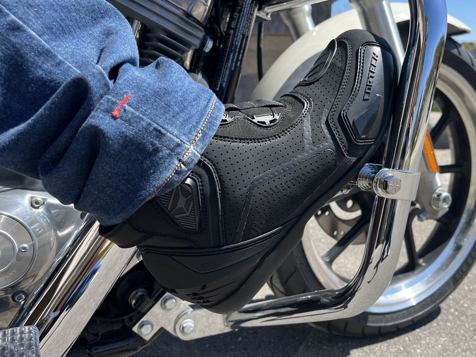 Cortech Sport Lite Boots rested on harley davidson sportster.
