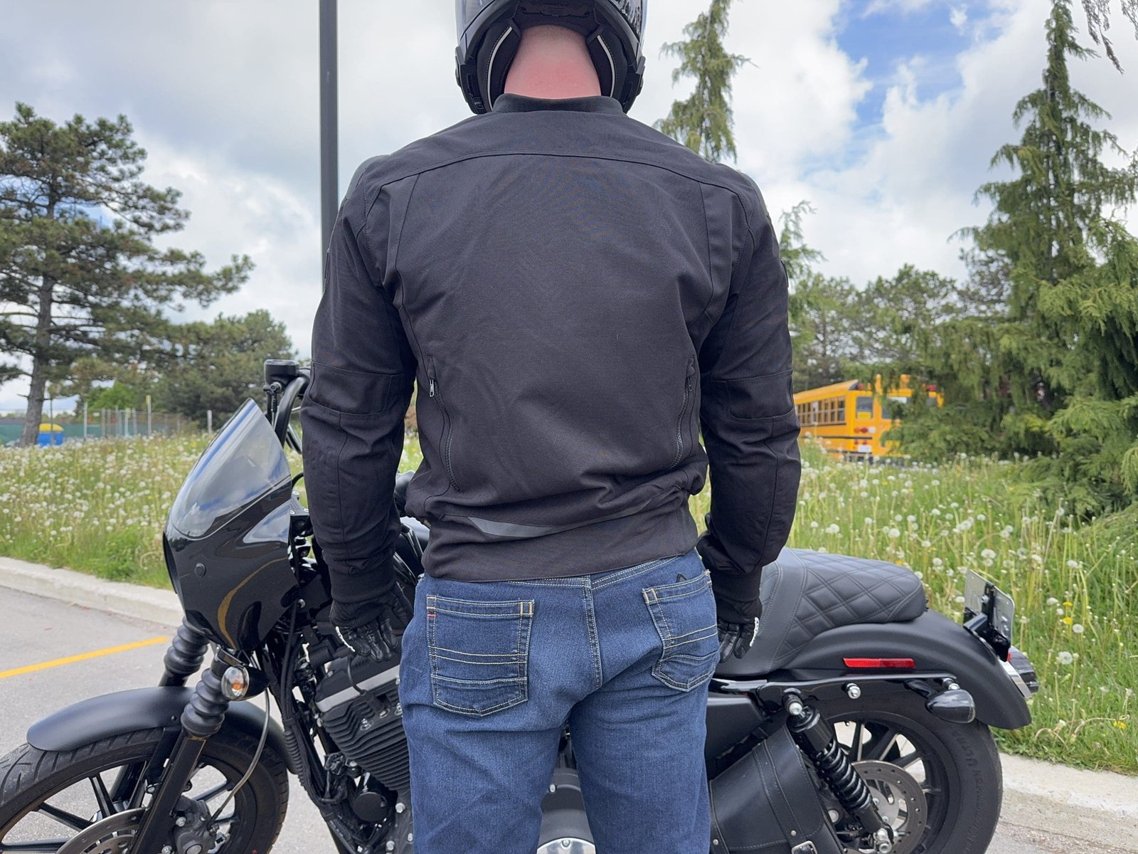 Rear view of the Cortech Versa-Flo Jacket on a rider