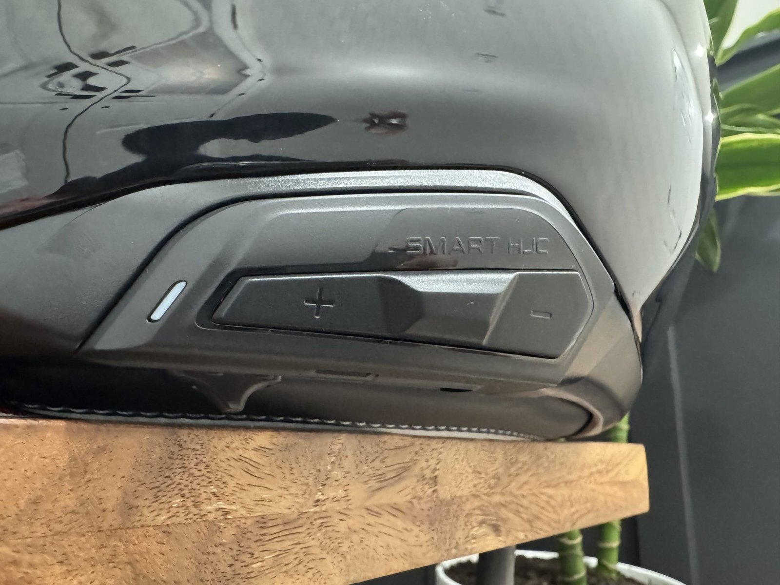 Close up photo of the SMART HJC Sena 50B bluetooth unit installed in the HJC RPHA 71 Carbon helmet