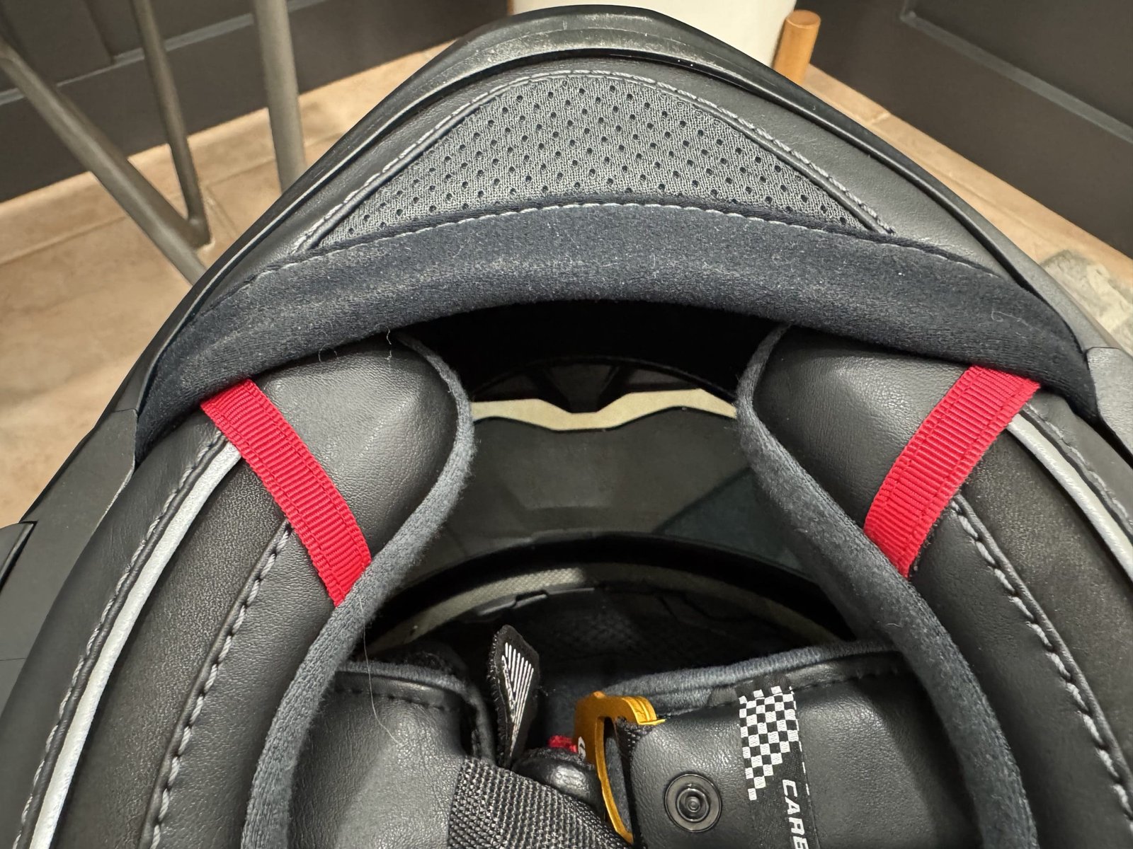 Emergency release pull tabs on the HJC RPHA 71 Carbon Helmet
