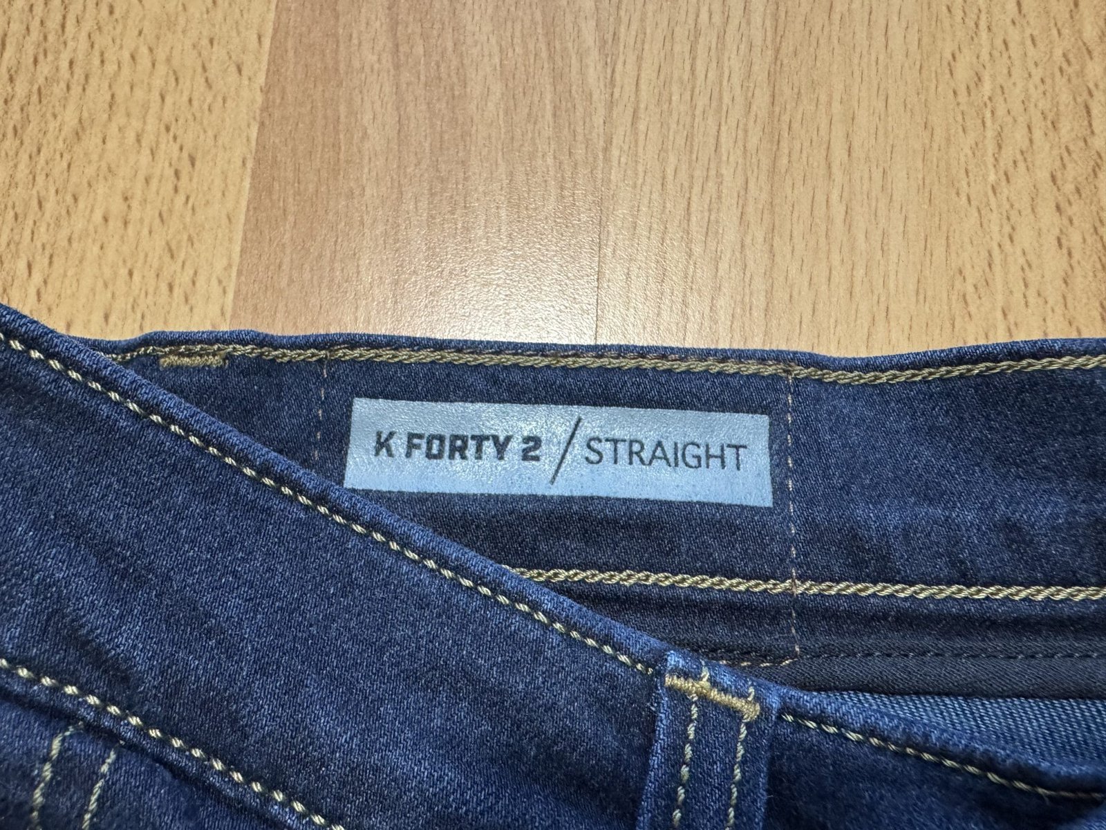 Close up image of the "Straight" tag on the K Forty 2 jeans