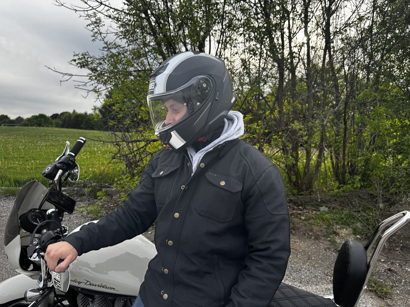 motorcycle rider wearing Shoei Neotec 3 Satori TC-5 Helmet