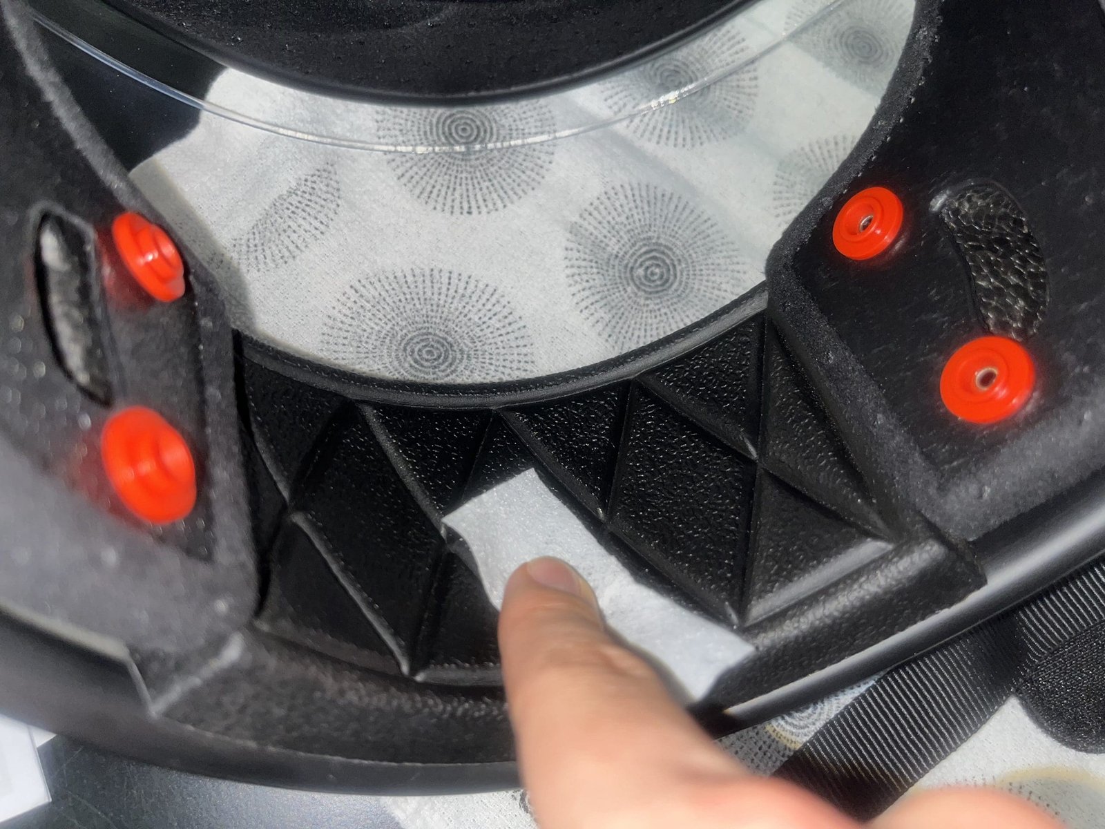 wiping inside of biltwell gringo SV with alcohol wipe to prep mic installation