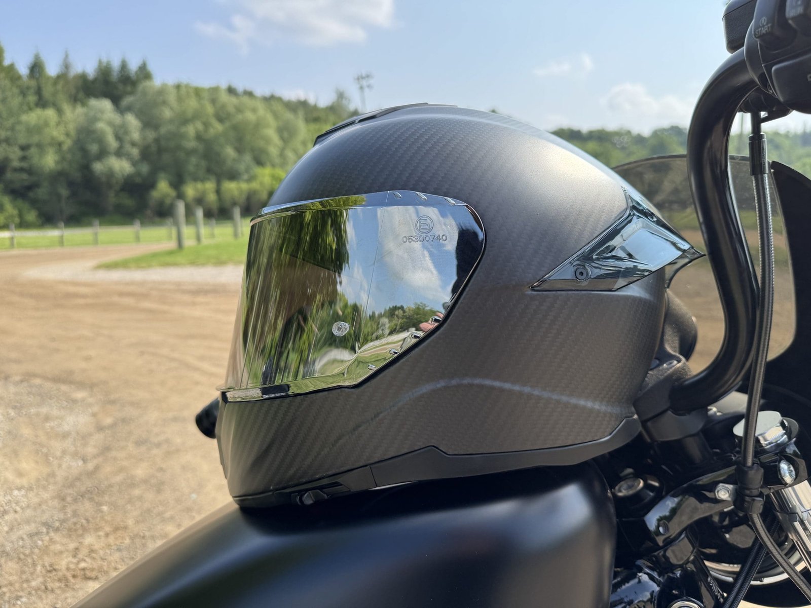 Side profile of the Voss 991 Carbon resting on a Harley Davidson gas tank