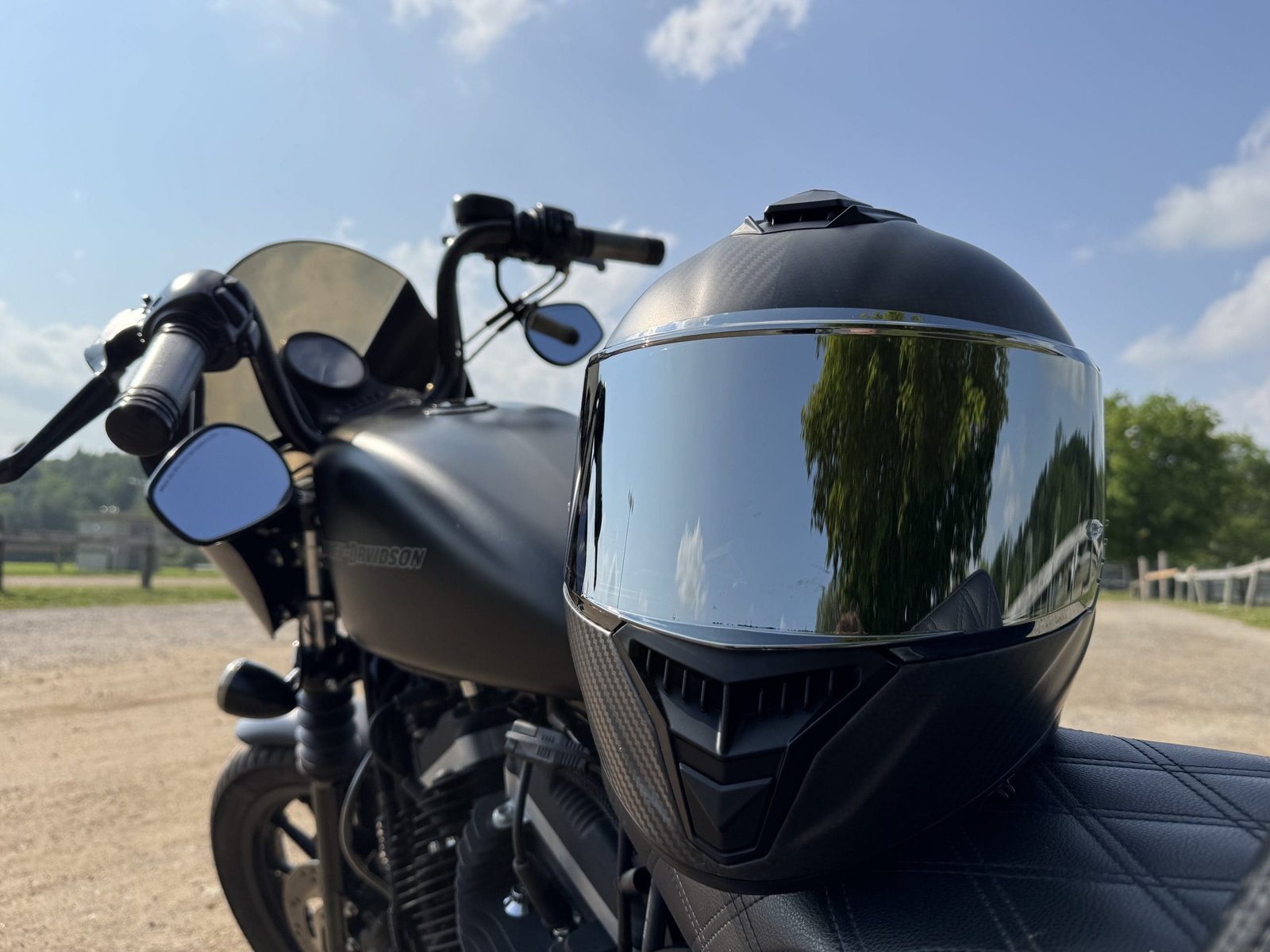 Close up photo of the Voss 991 Carbon resting on a Harley Davidson