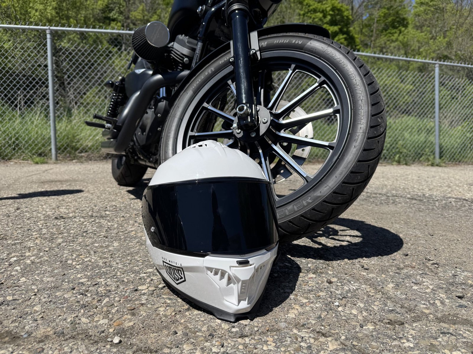 Voss 993 Moto-S pictured in front of a Harley Davidson Iron 883