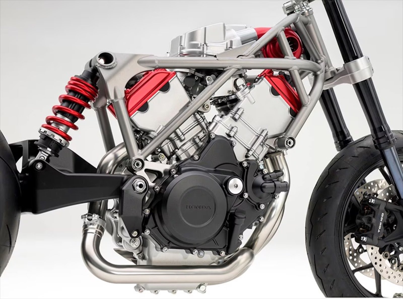 A view of Honda's V3R including the new electric supercharger Honda's got coming through the pipeline.