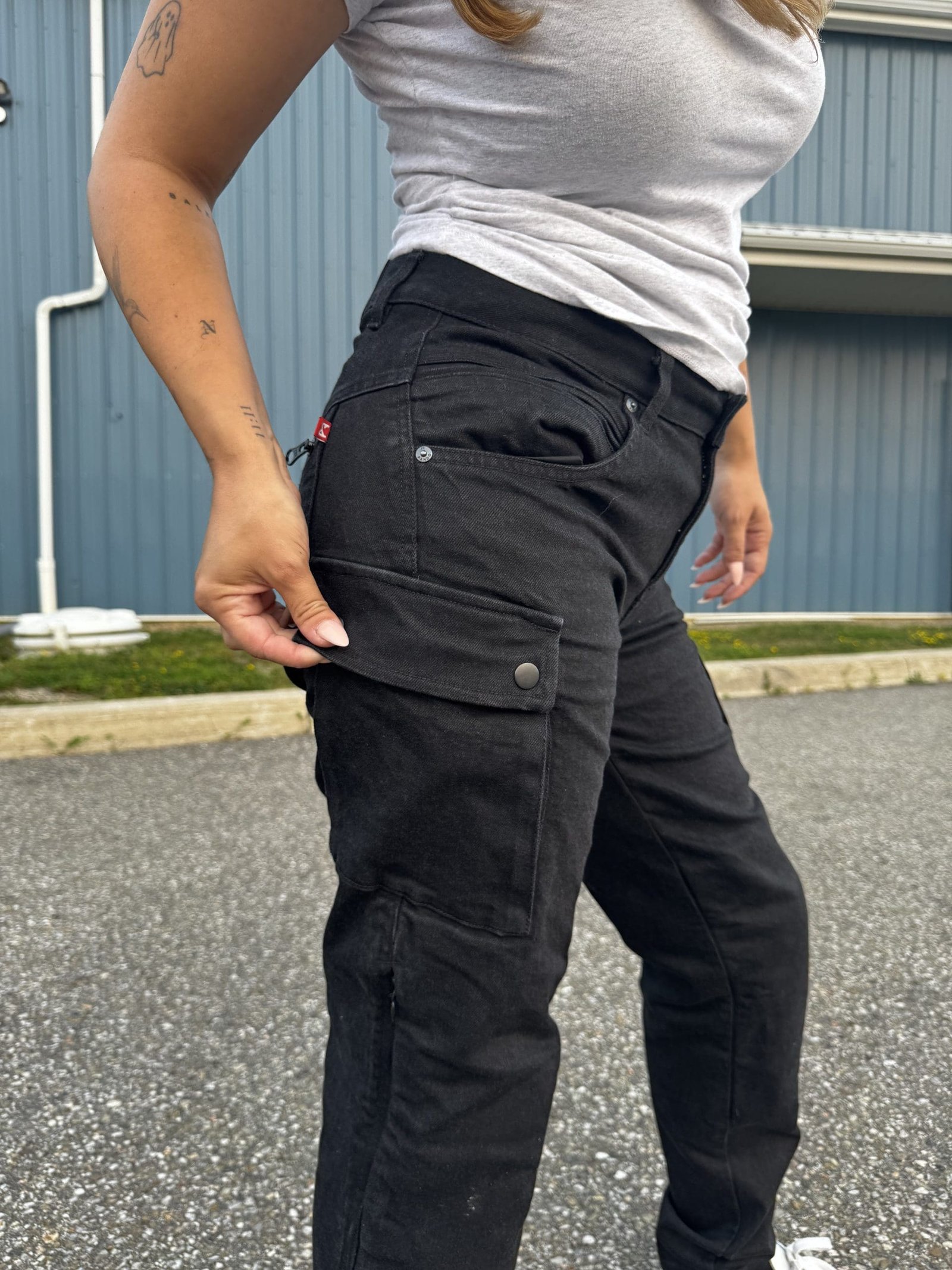 Pando Moto MILA Cargo jeans worn off-bike during sunset