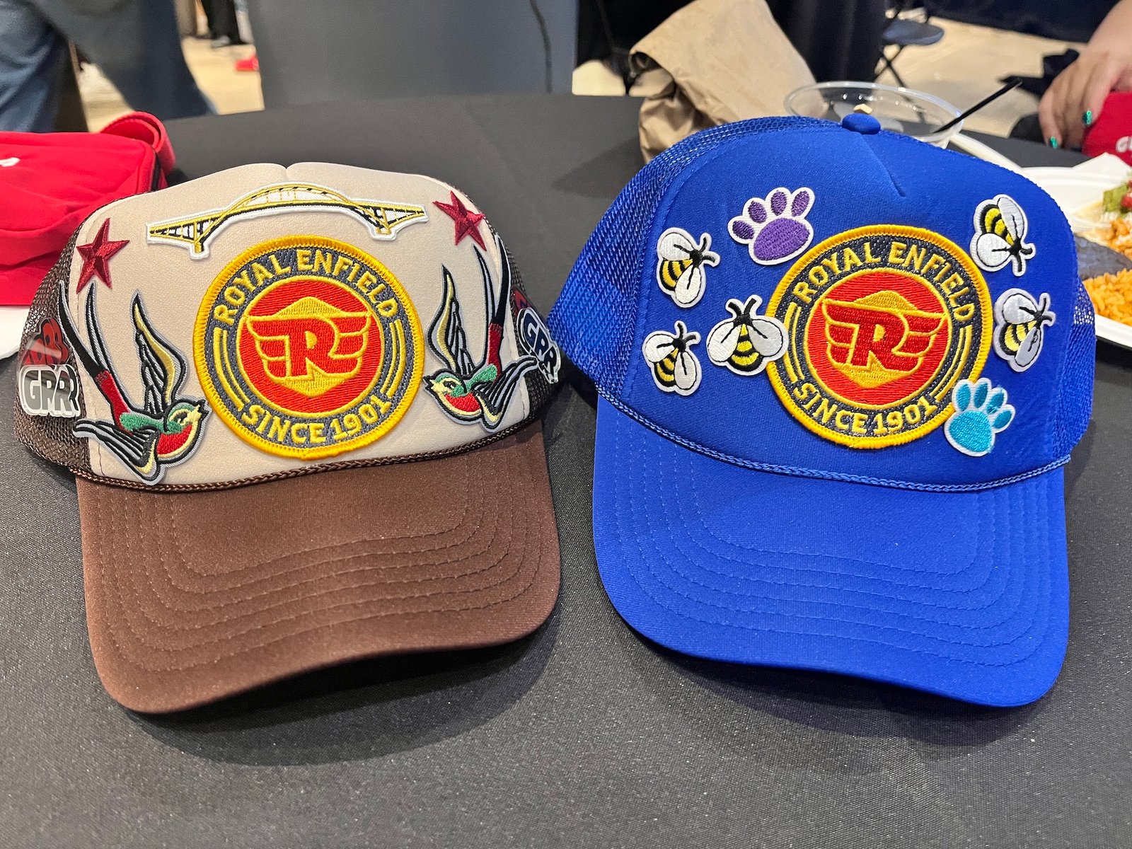 A picture of two custom hats