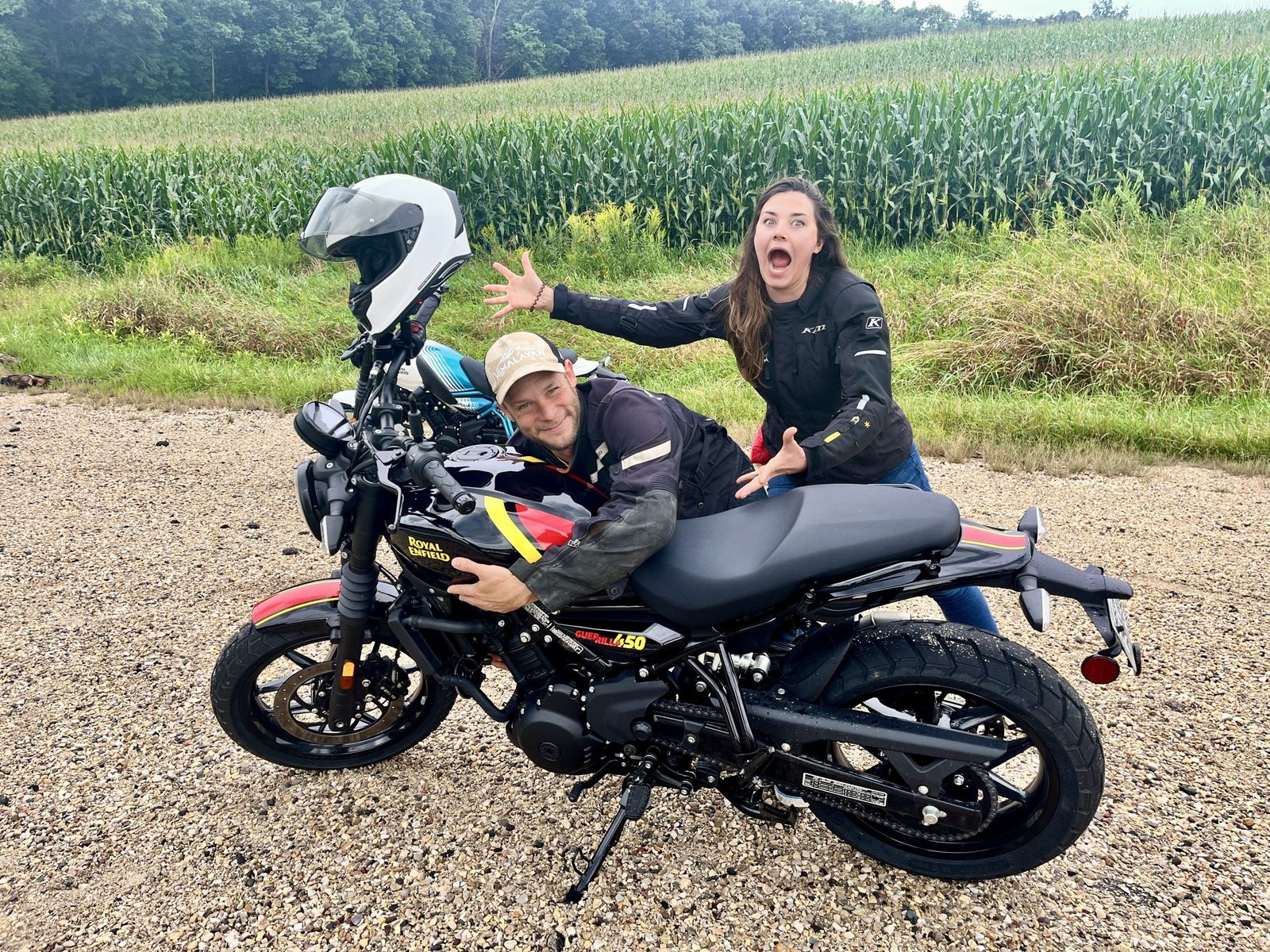 Amanda Quick and Ed Cobb hugging a bike.
