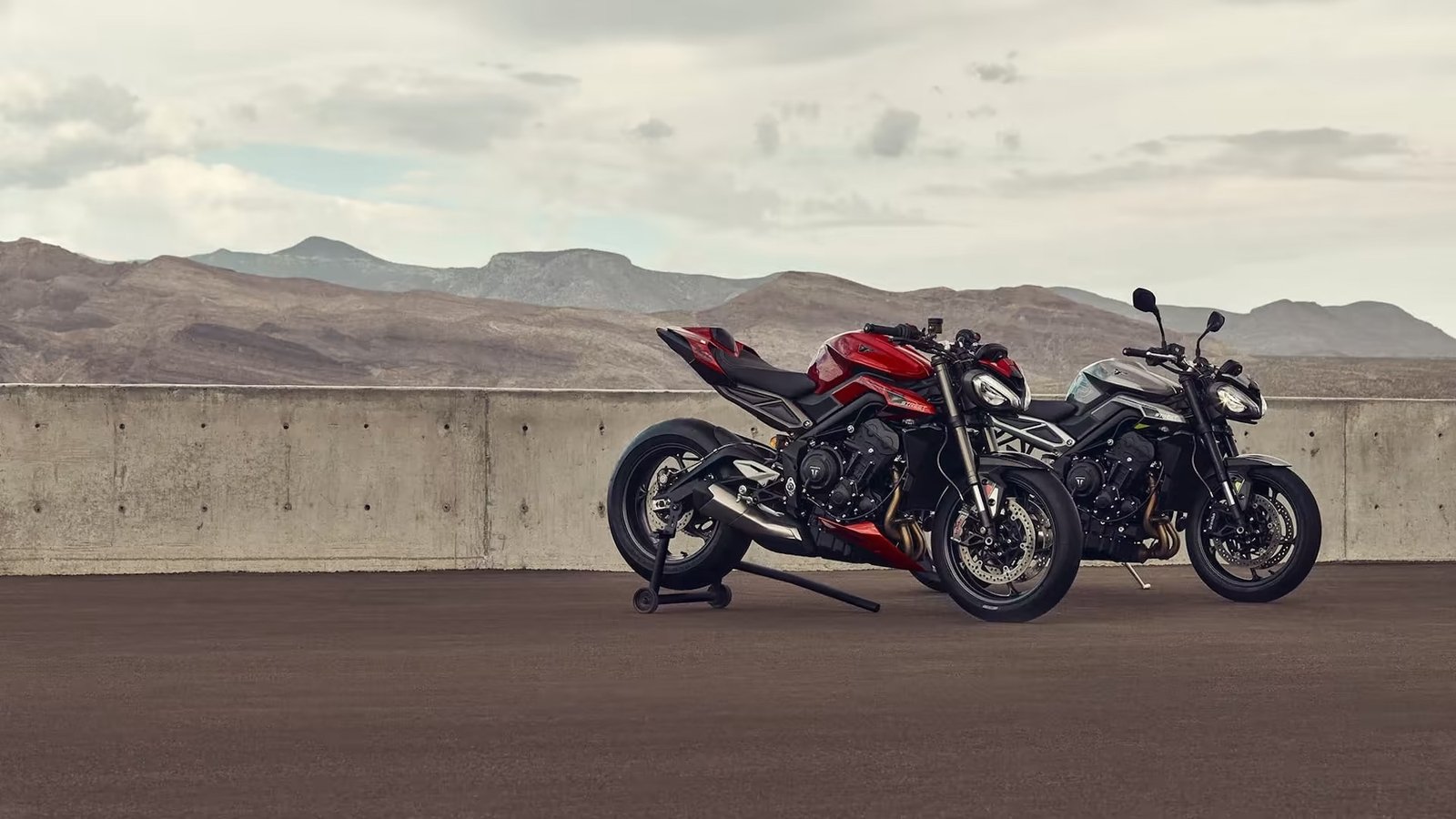 A side view of two Triumph Street Triple 765 motorcycles