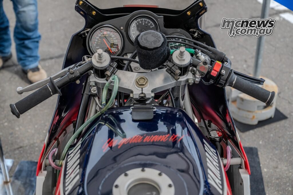 Fuel tank on the Yamaha FZ750 0U45 featuring the handwritten message “Ya’ gotta want it!” used during the 1986 Daytona 200.