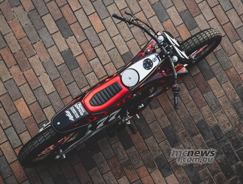 Carolina Reaper flat track-inspired custom motorcycle based on the Royal Enfield Guerrilla 450, built by Cheetah Custom Cycles.