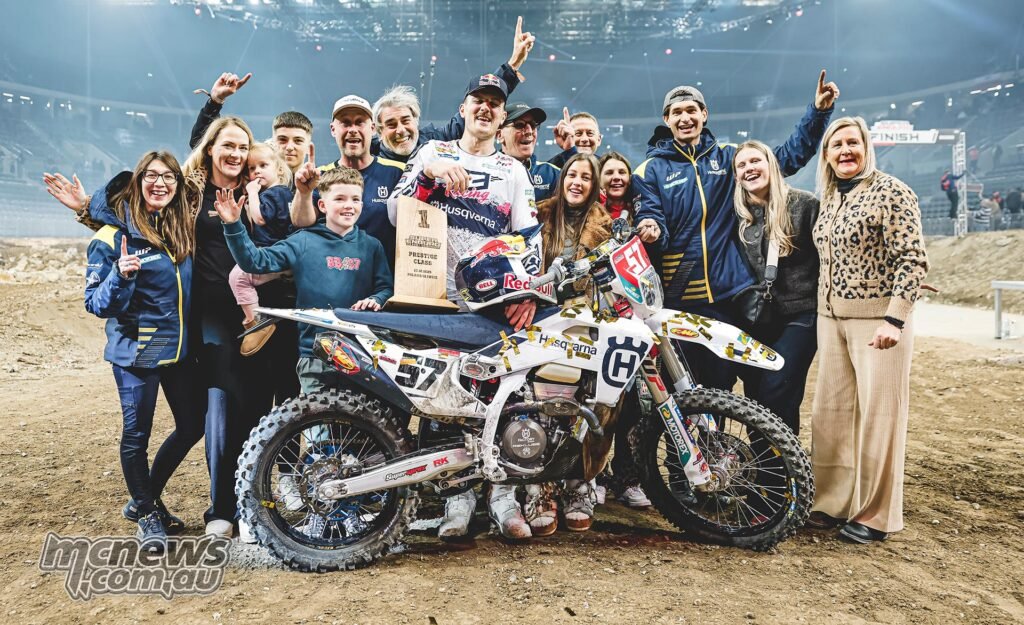 Billy Bolt standing on the podium after winning round one of the 2026 SuperEnduro World Championship.