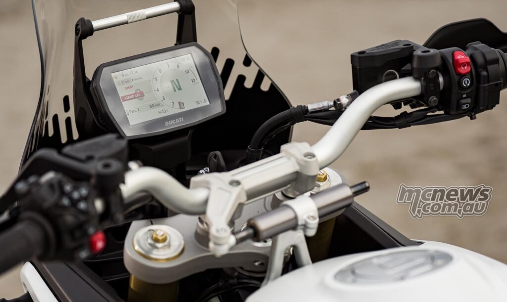 DesertX cockpit with 5-inch TFT dash and left-hand joystick controls
