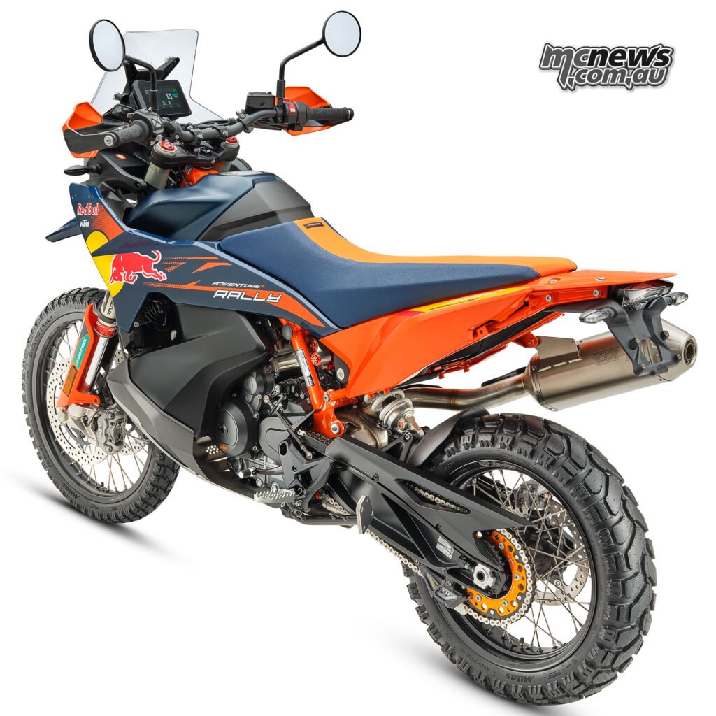 2026 KTM 890 Adventure R Rally rear left three-quarter view showing Akrapovic slip-on and 21/18-inch spoked wheels