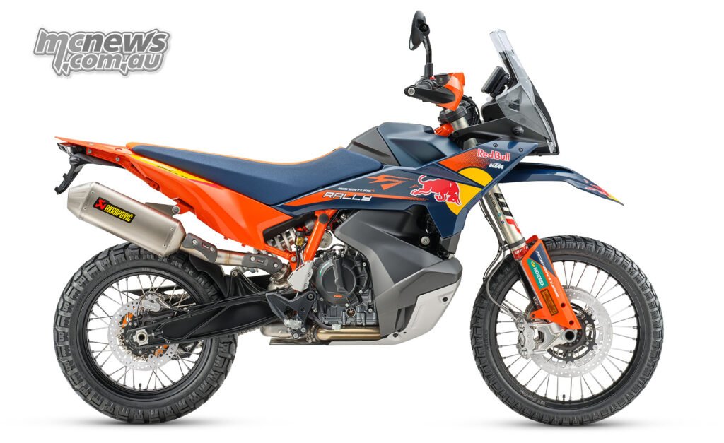 Right-side profile of the 2026 KTM 890 Adventure R Rally showing Akrapovic exhaust, parallel-twin engine and rally chassis
