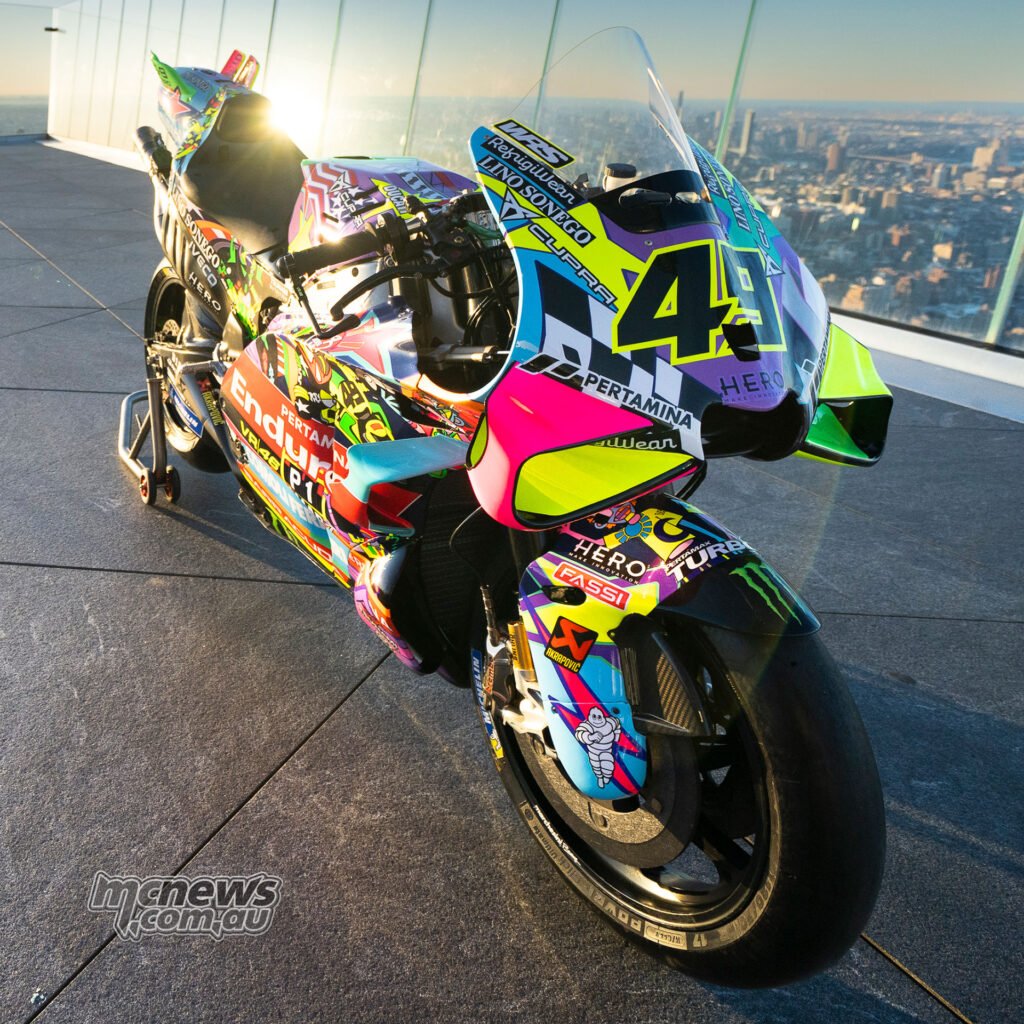 Front three-quarter close-up of the number 49 VR46 MotoGP Ducati in special New York launch livery with bright fluorescent col