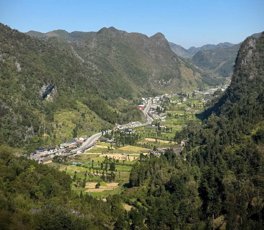 Dong Van in the Ha Giang Province which borders China, is as stunning as it is remote. Generations of Vietnamese farmers have carved out rice terraces and established complex hydraulic systems which irrigate the land and make it possible to farm all year. The local markets are alive with the trading of life's essentials. A farmer who raises pigs may walk them to town to trade them for rice and other goods.