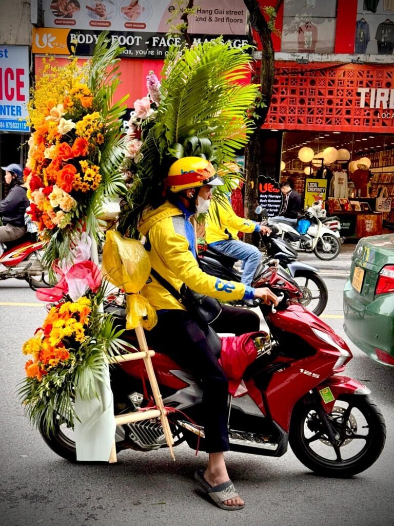 Delivery and transport by scooter is really the norm in Vietnam.