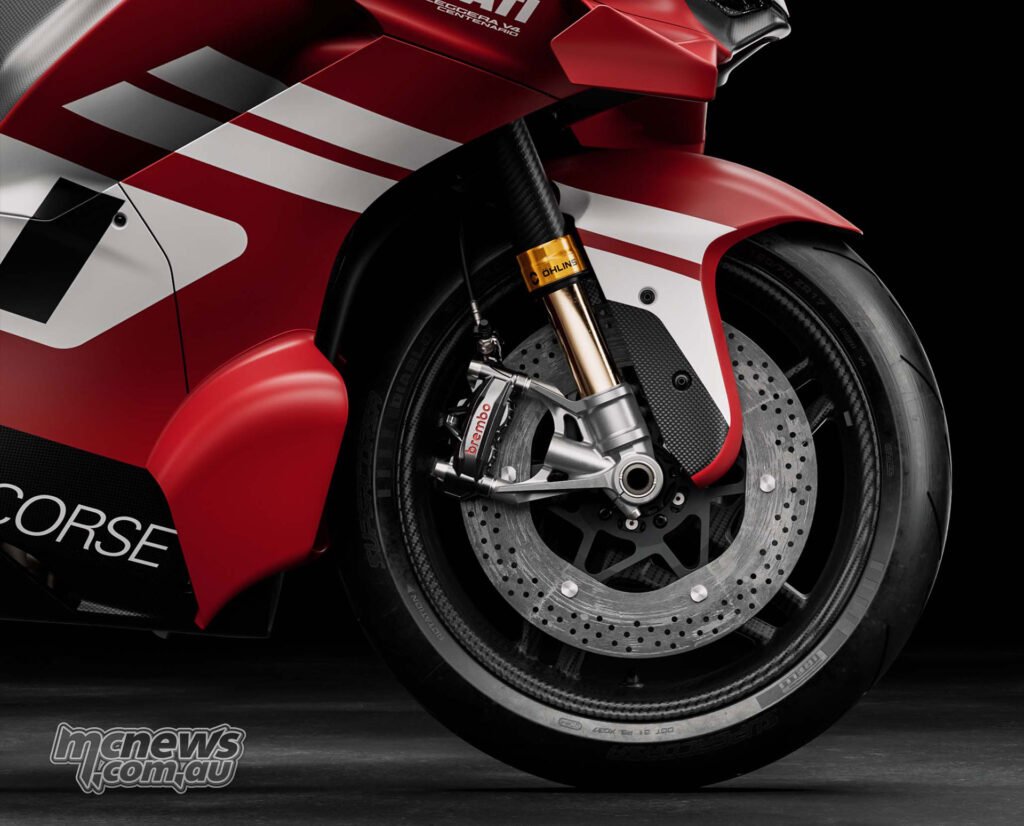 Front wheel and fork detail of the Ducati Superleggera V4 Centenario in Rosso Centenario livery.