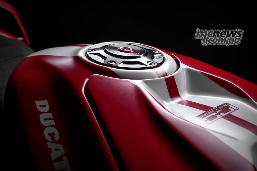 The tank treatment carries Ducati’s new Rosso Centenario finish and white striping across the limited-edition flagship.