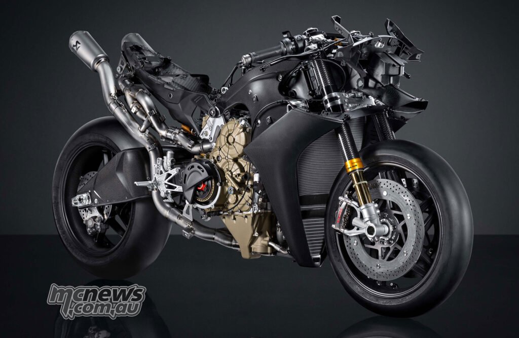 Close-up of Ducati Superleggera V4 Centenario front brake, carbon-ceramic disc and Öhlins carbon-sleeved fork.