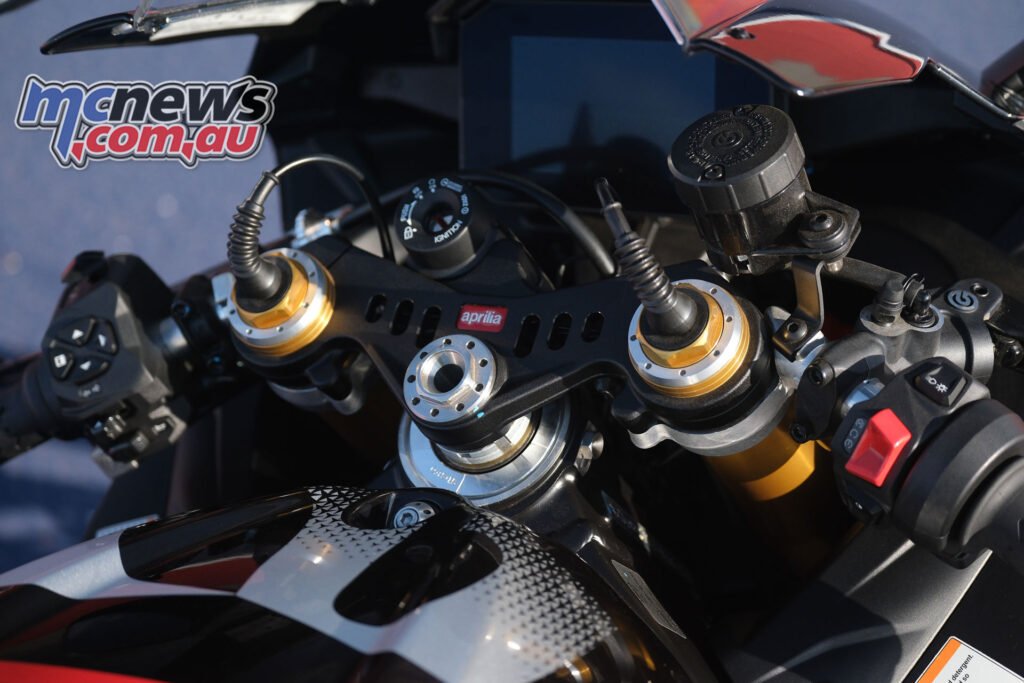 Aprilia RSV4 Factory 1100 cockpit showing TFT dash and rider controls