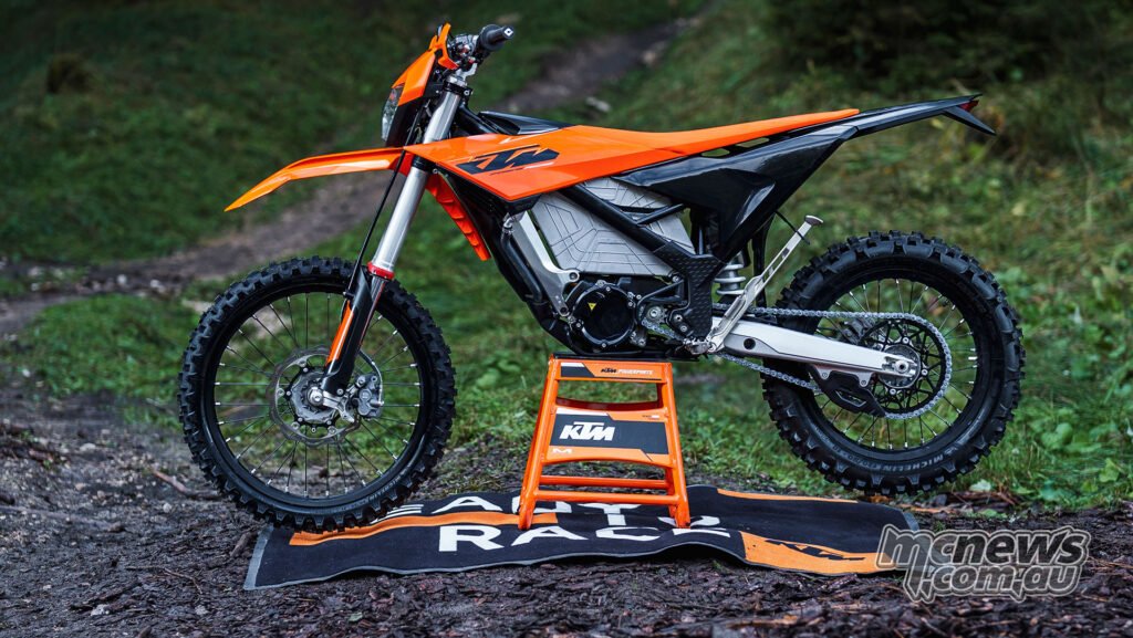 Full left-side profile of the 2027 KTM Freeride E showing the electric drivetrain and off-road chassis.