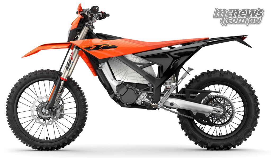 Studio left-side profile of the 2027 KTM Freeride E showing its slim bodywork and long seat.